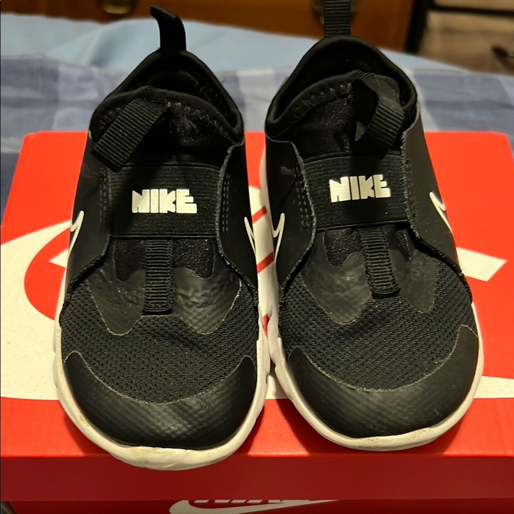 Nike Black and White Slip-On Sneakers